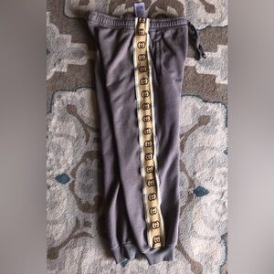 Gucci Gray Sweatpants with Beige Logo Stripe